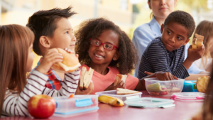 Children eating school lunch